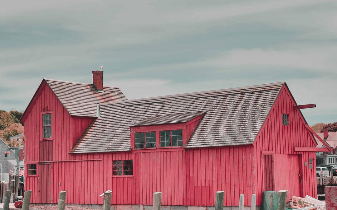 Red pole barn construction in Langley, BC