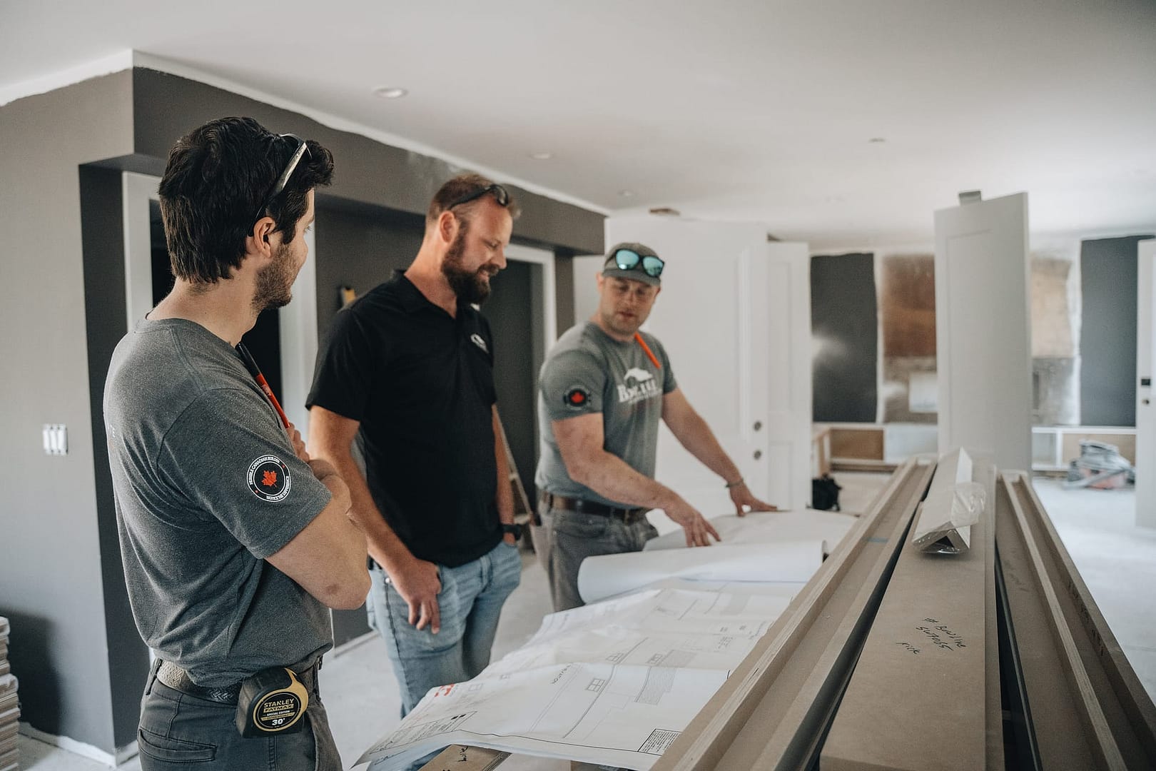 home renovation contractors Staff discussing a home renovation project in Langley