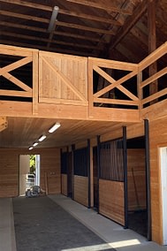 A newly constructed barn showcasing traditional wooden design. An example of agricultural buildings in Langley, BC