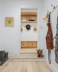 An image of a walkway with staircase, aprons and hats that is made by home renovation contractors in Langley, BC