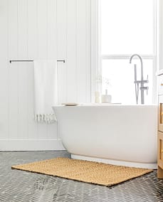 An image of a bathroom with bathtub made by home renovation contractors in Langley, BC