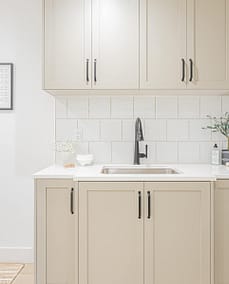 A picture of a white wooden kitchen cabinet with custom additions in Langley, BC