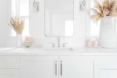 A picture of a bathroom with white countertop made by home renovation contractors in Langley, BC