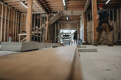 Two Bowline Construction staff in a process of pole barn construction in Langley, BC