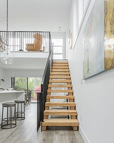 A wooden stairs custom build by Bowline Construction