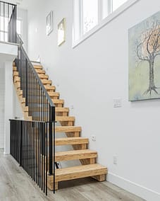 A wooden stairs custom build by Bowline Construction