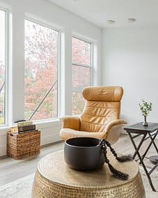 A second floor entertainment area with custom addition couch