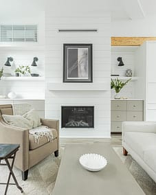 A white accent living room with modern design by design-build contractors in Langley, BC