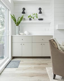 A white accent living room with modern design by design-build contractors in Langley, BC