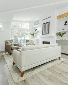 A white accent living room with modern design by design-build contractors in Langley, BC