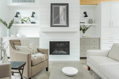A white accent living room with modern design by design-build contractors in Langley, BC