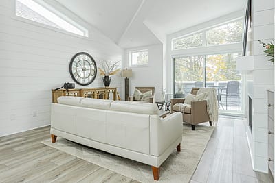 A white accent living room with modern design by design-build contractors in Langley, BC