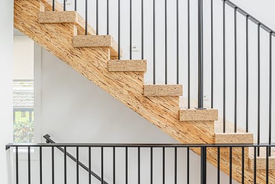 A wooden stairs custom build by Bowline Construction