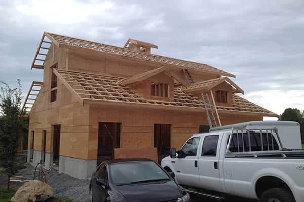 wooden house structure and foundation under construction