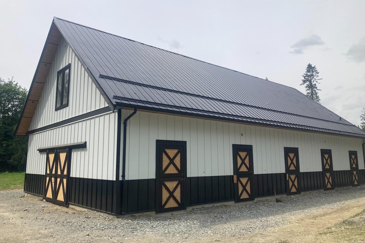 processed-3E4A34B6-5B9A-4932-890D-F6FC7B3A06A6-1 wooden house structure and foundation under construction