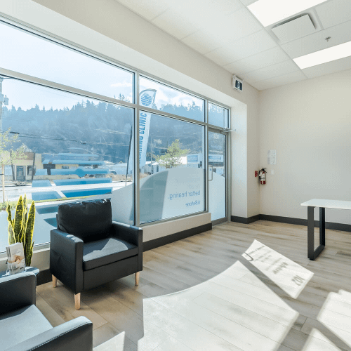 Bright reception area with seating showcasing commercial tenant improvements by Bowline Construction in Langley, BC
