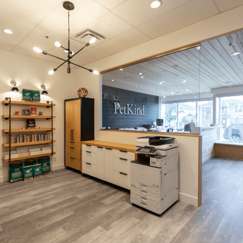 Retail space with product shelving and reception counter showcasing commercial tenant improvements by Bowline Construction in Langley, BC